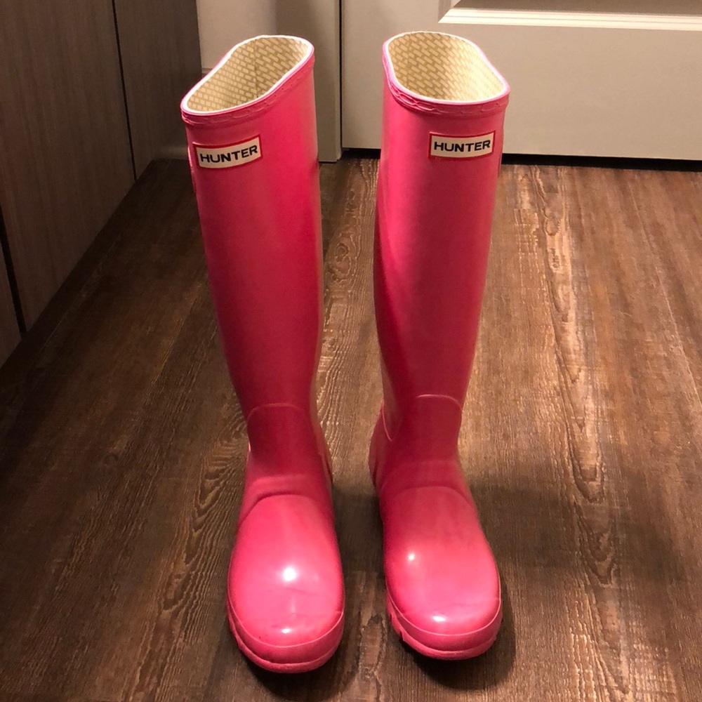 Tall pink glossy Hunter boots